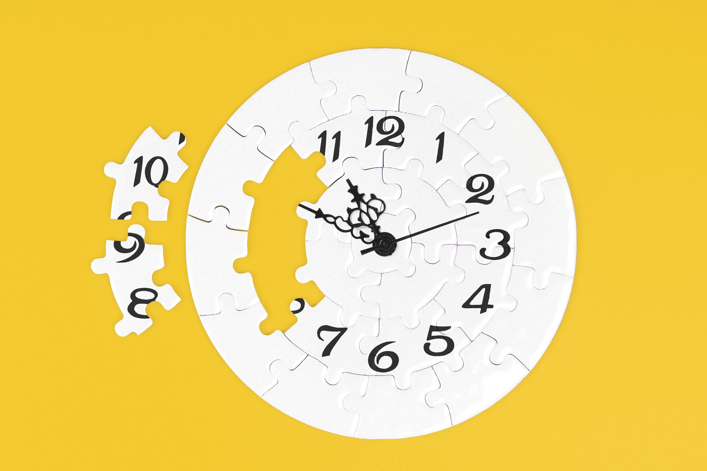 Puzzle Clock on a yellow background
