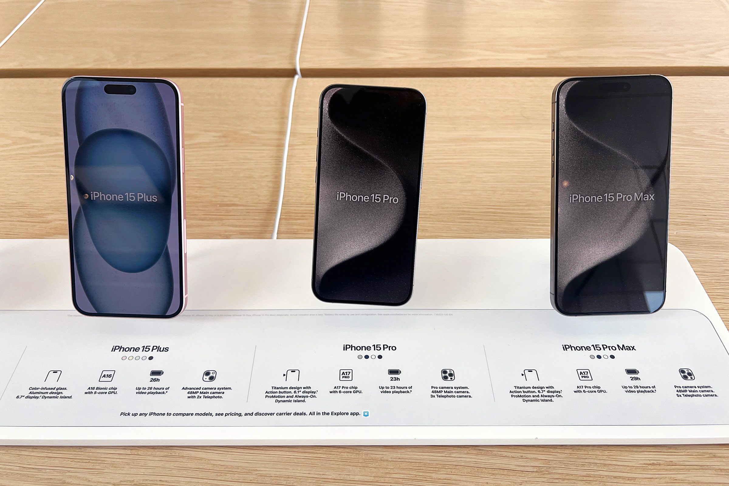 three different iphone 15 at apple store