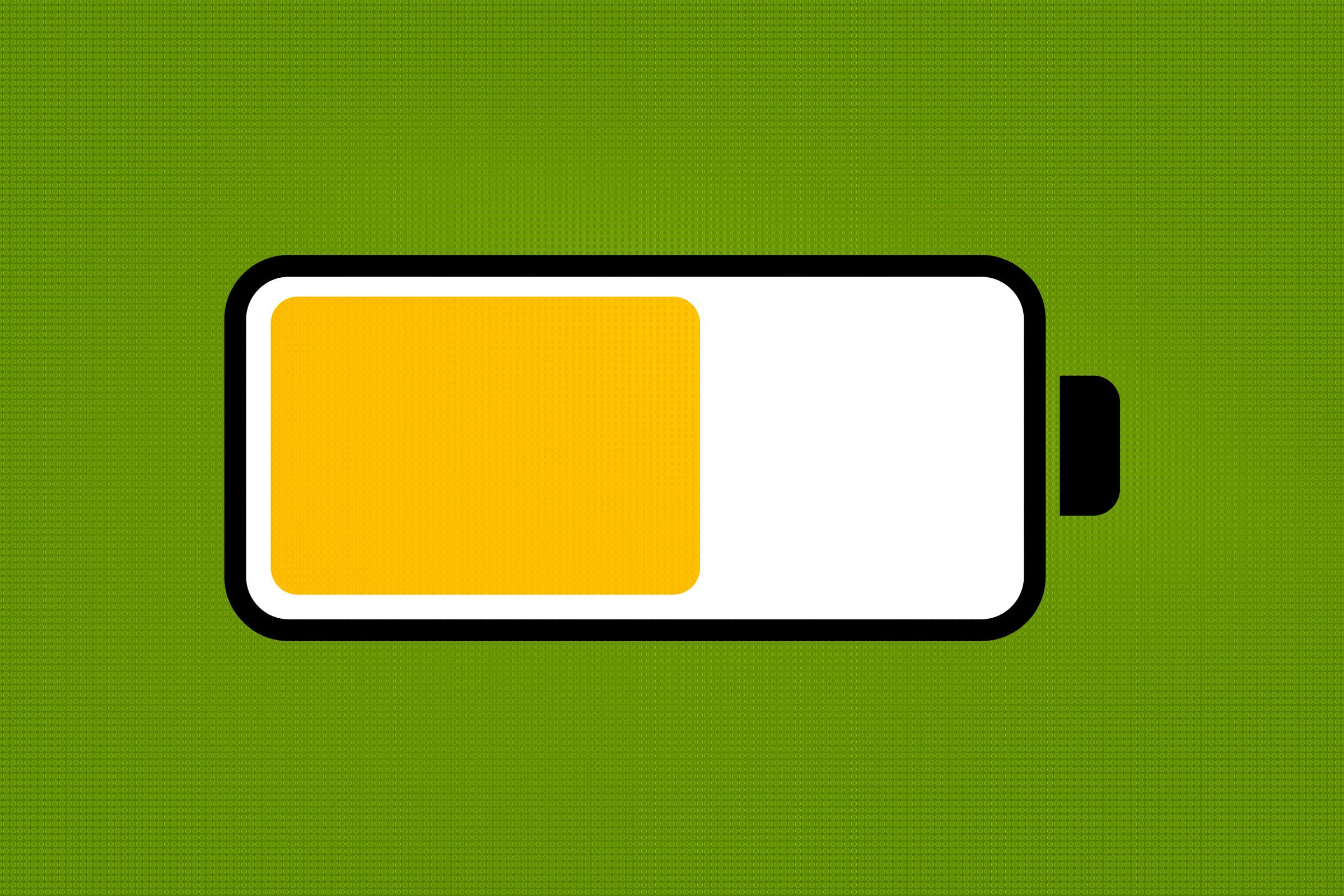 yellow low battery mode iphone battery icon on a green background