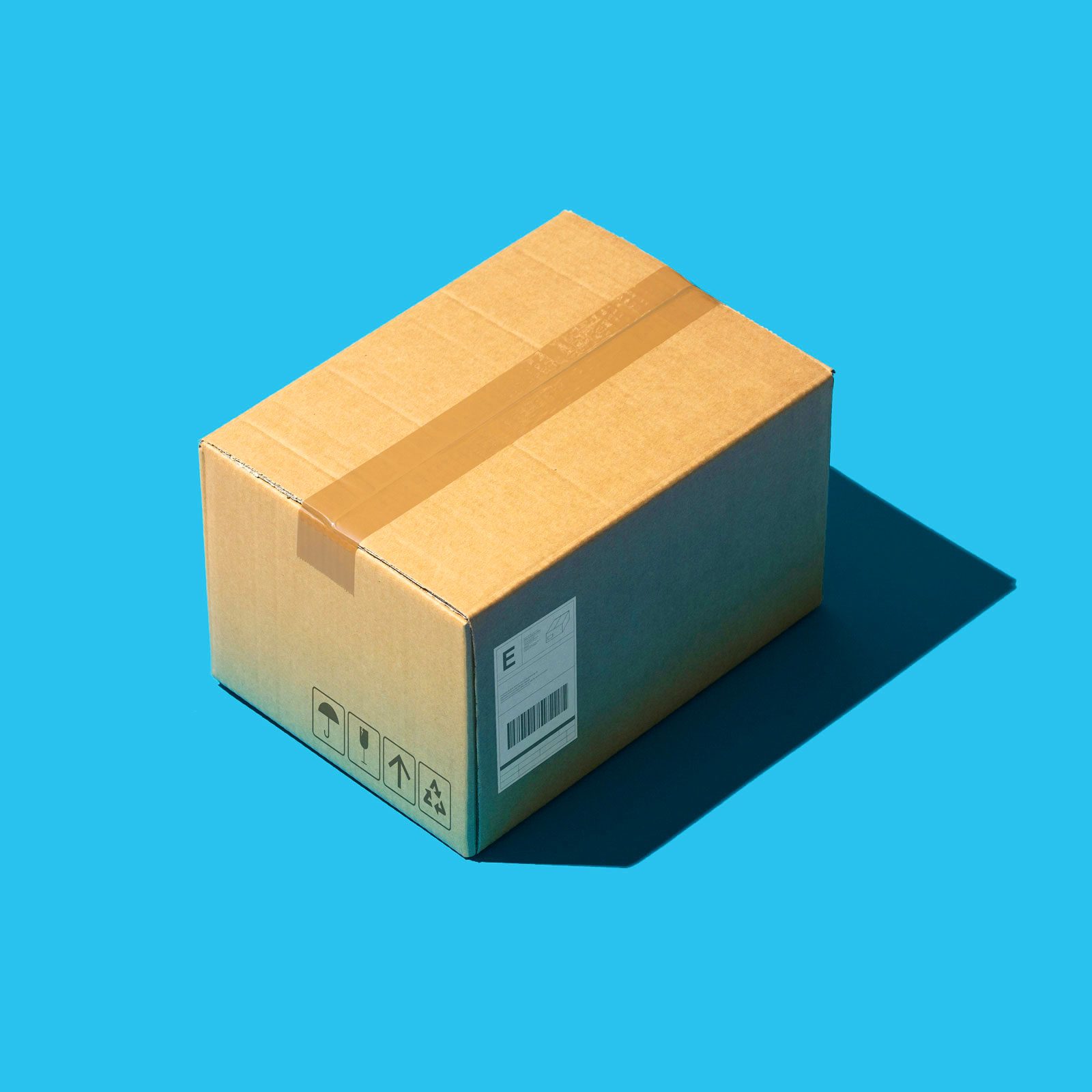 cardboard shipping box on a blue background