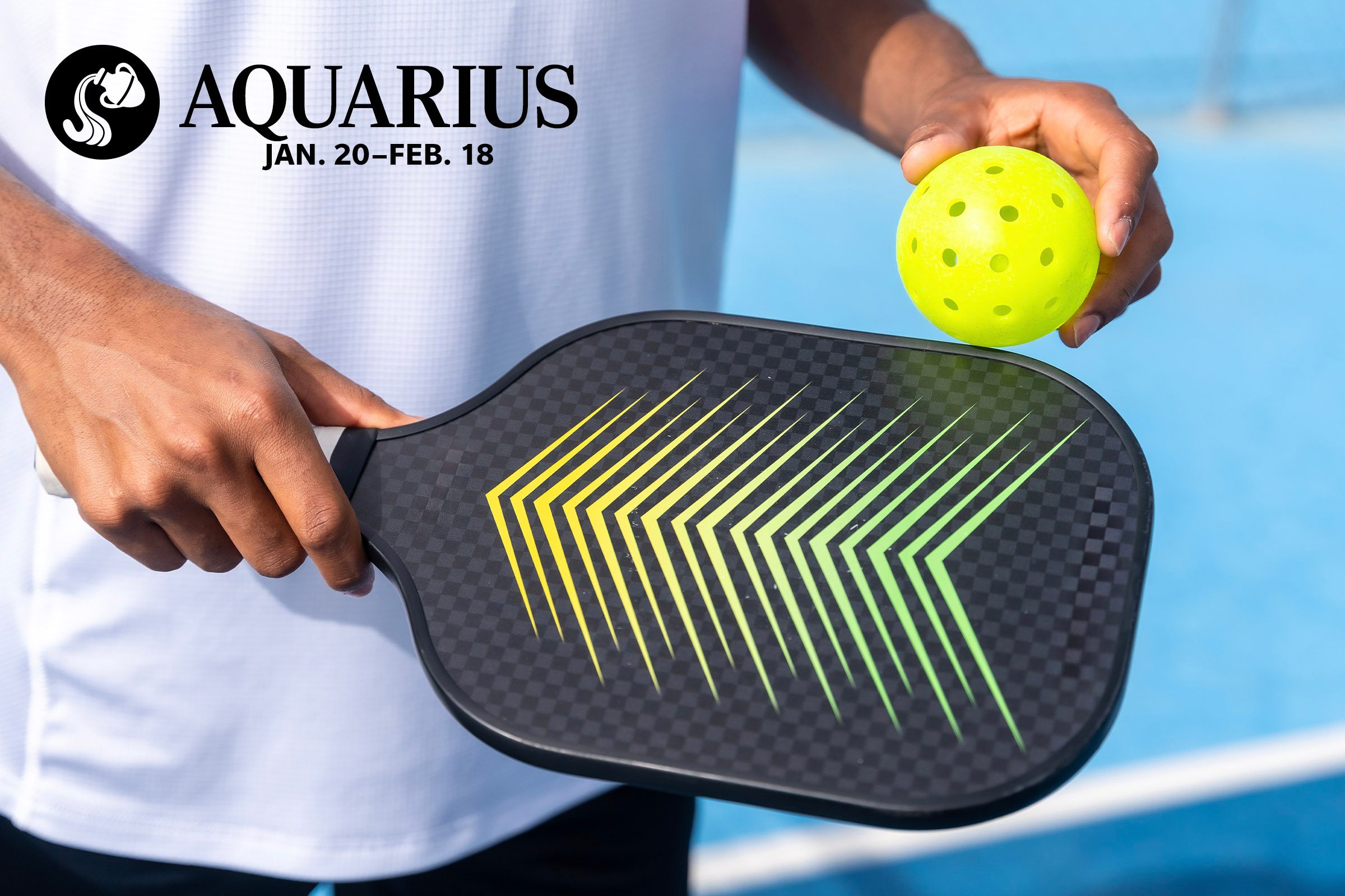 close up of man hands holding pickle ball paddle and ball