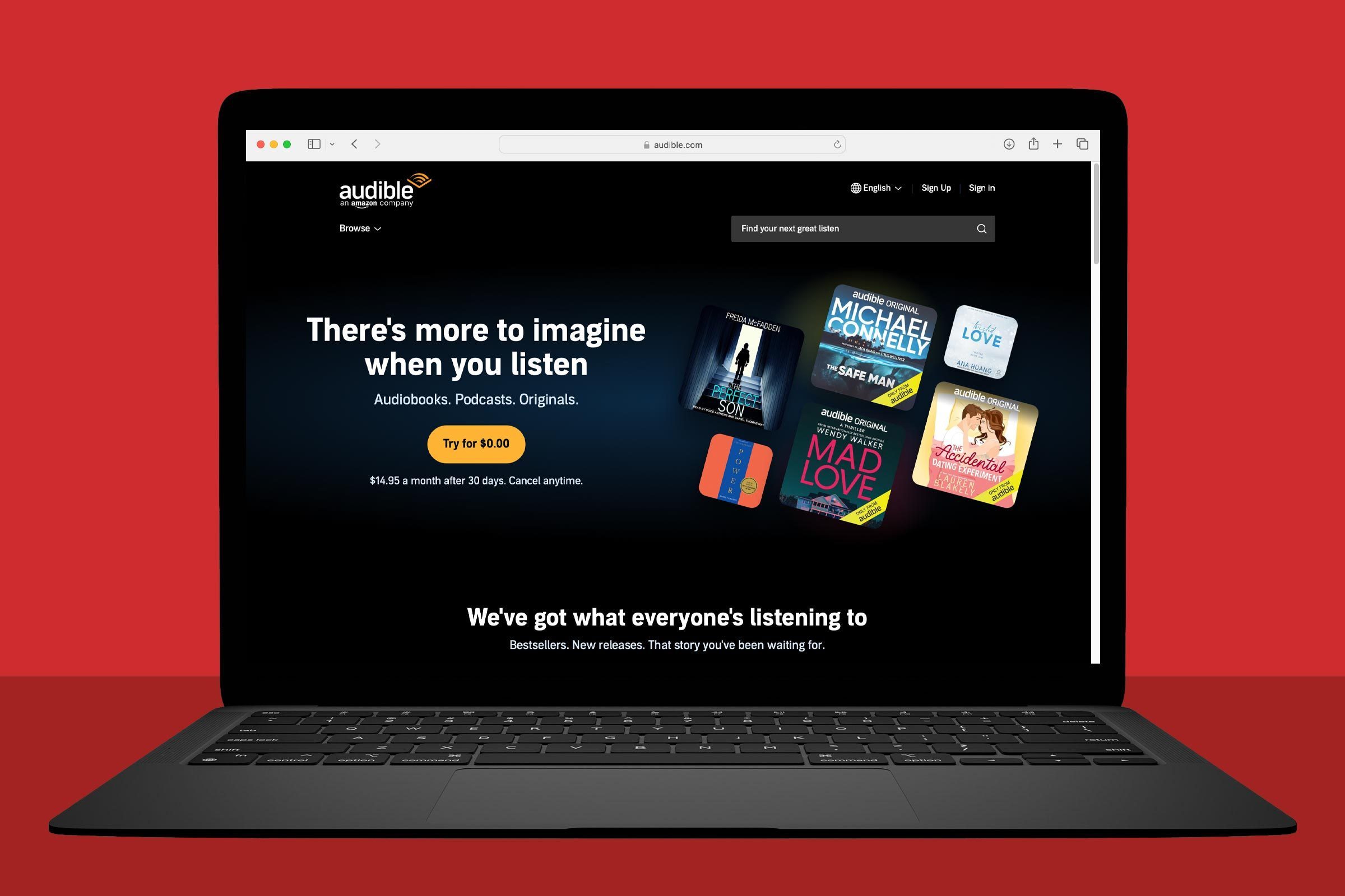 Places To Get Audiobooks For Free Online laptop showing Audible.com on red background