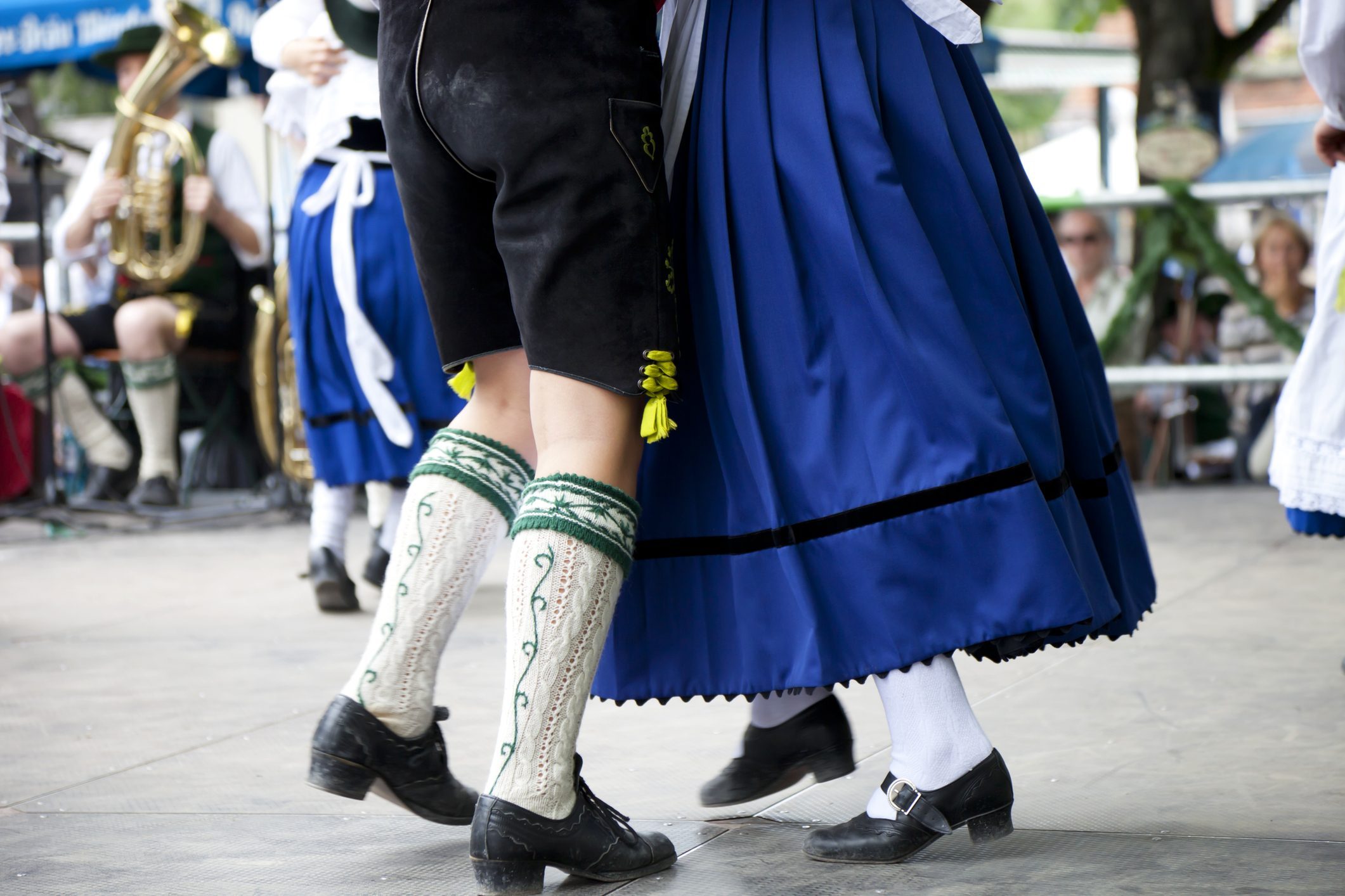 Bavarian couple in traditional outfits at Beer Fest dance