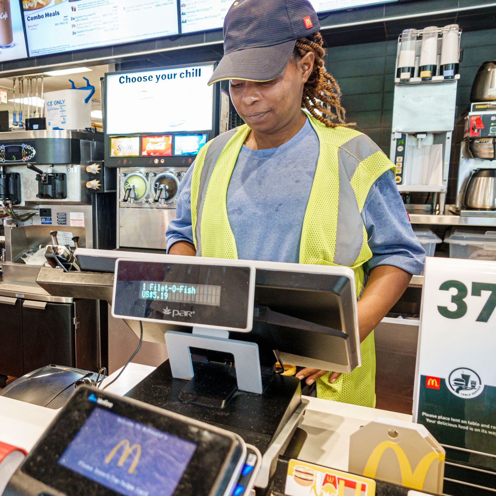 Mcdonald's cashier taking fast food order