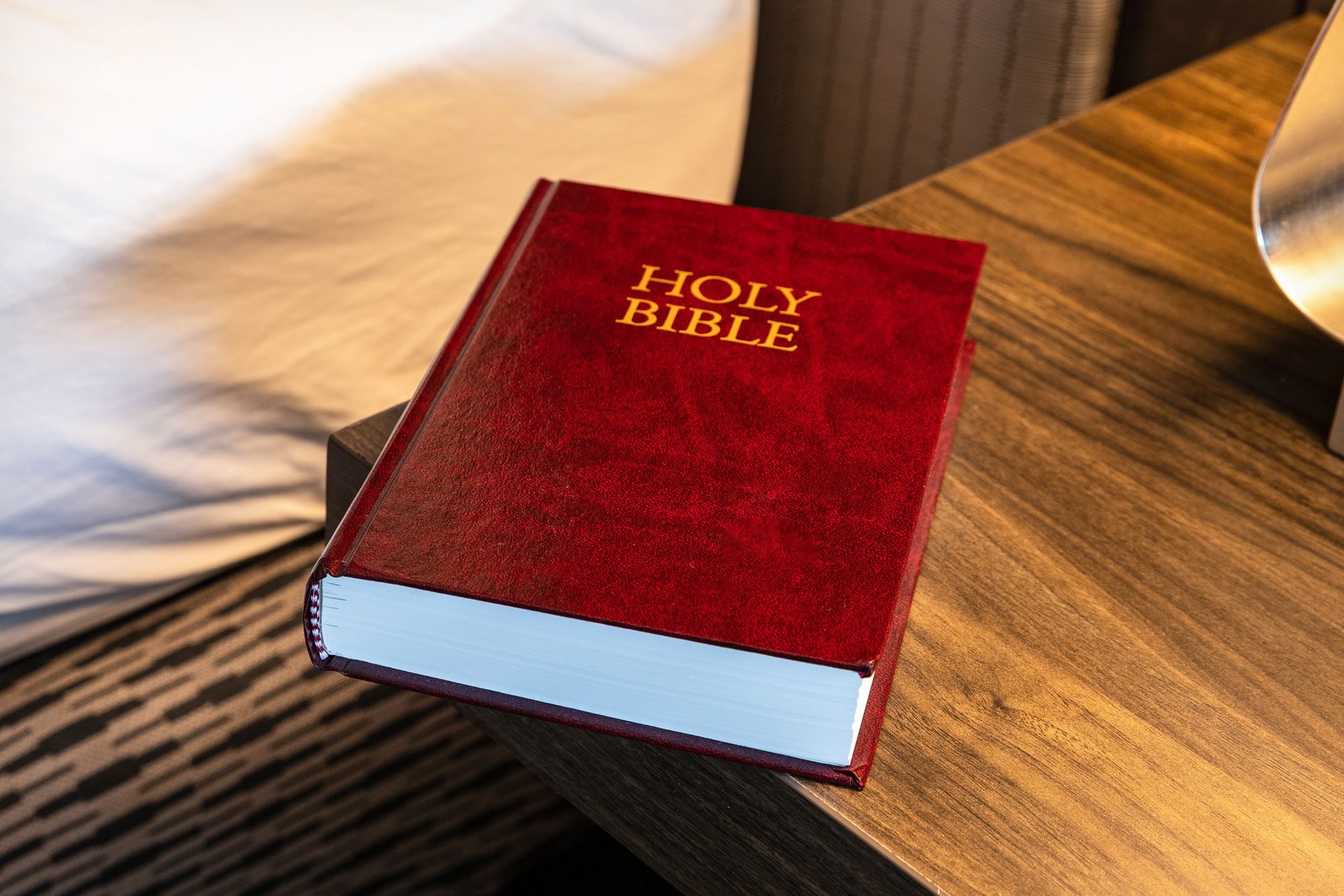 Bible In Hotel Room On Night Stand
