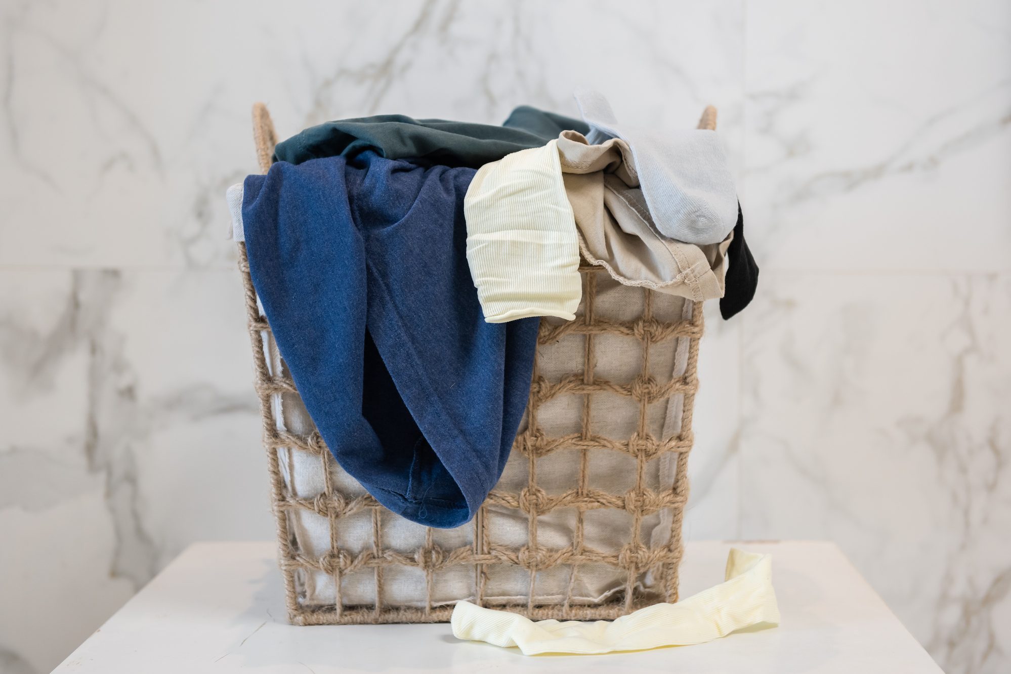 Dirty clothes in the laundry basket