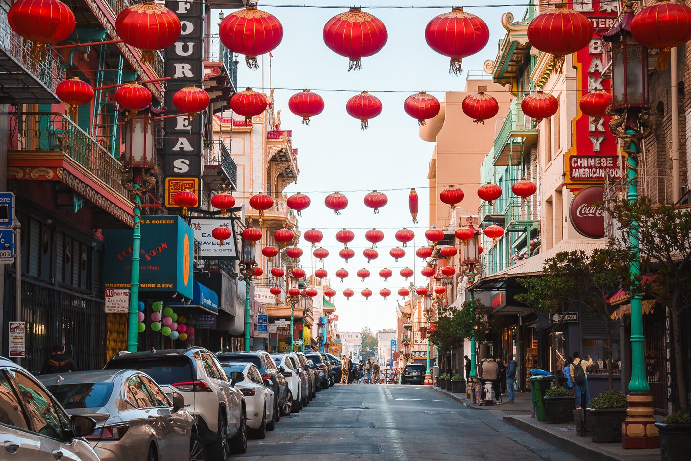 Vibrant Chinatown street scene in San Francisco with red lanterns and Chinese architecture