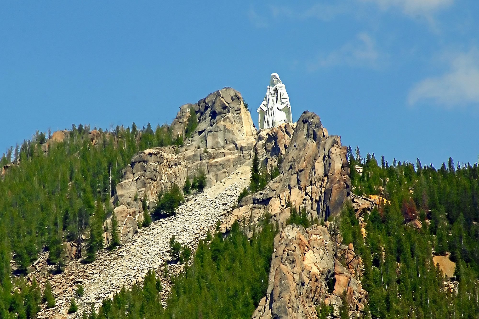 Our Lady of the Rockies watches over the city.